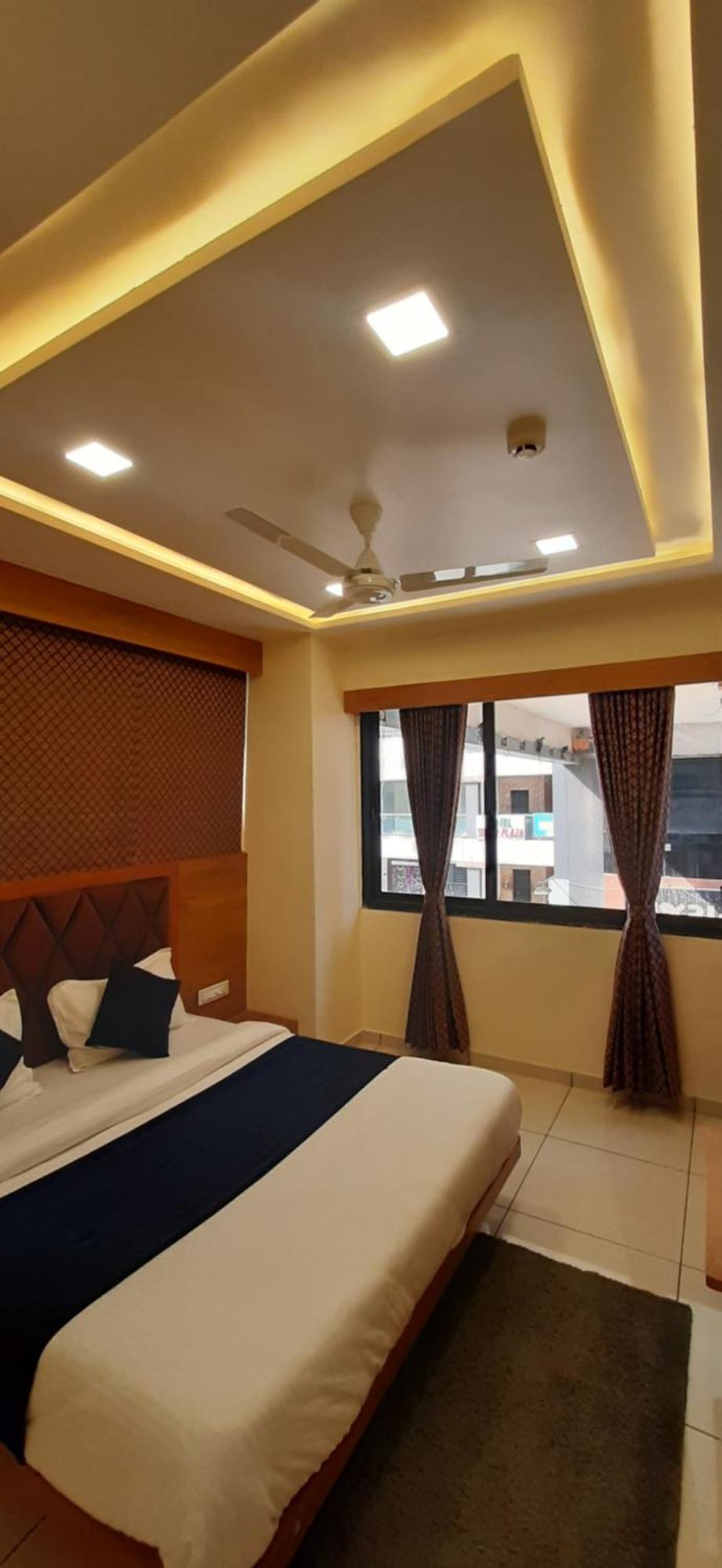 Hotel Suncity Ахмедабад Номер фото