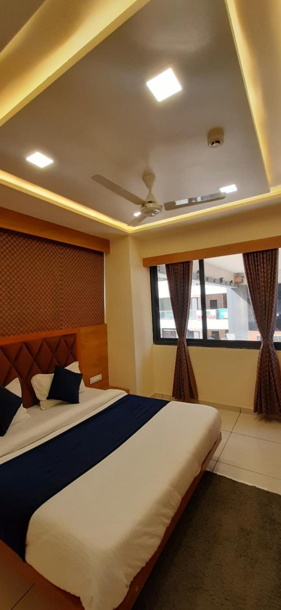 Hotel Suncity Ахмедабад Номер фото
